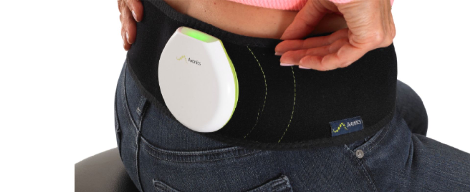 Axonics® System charging on a person's belt